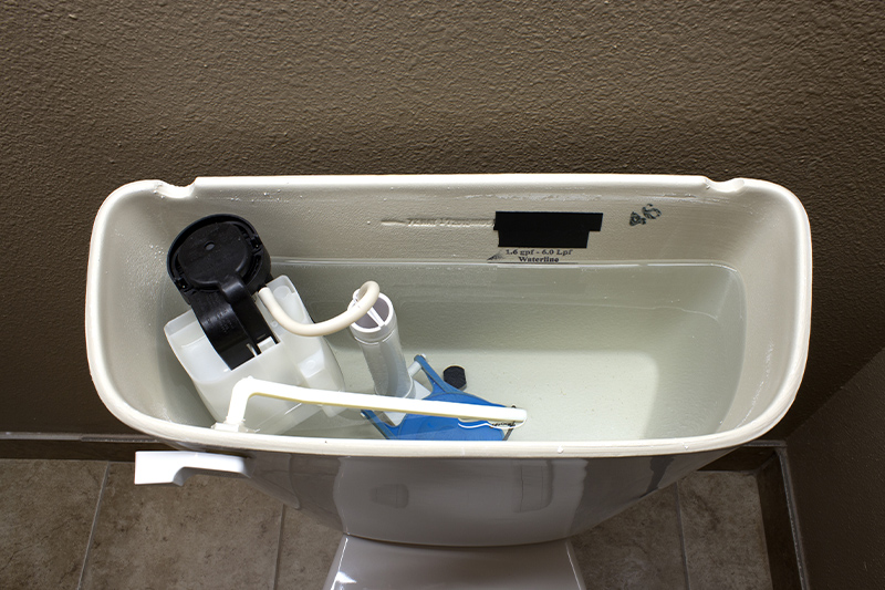 Water running in the tank of a toilet