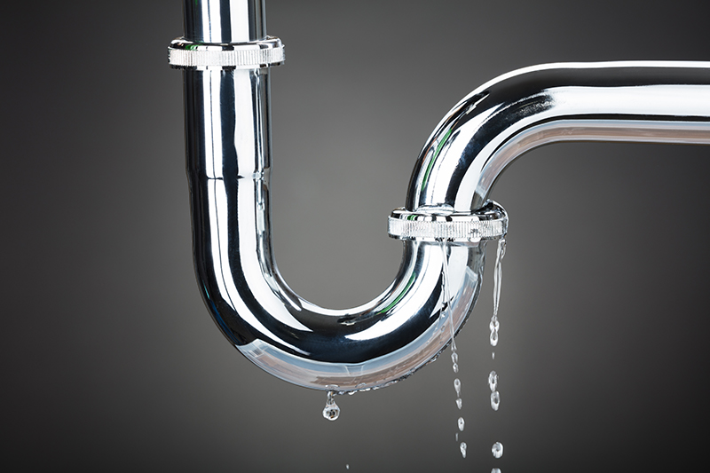 water leaking from a toilet pipe