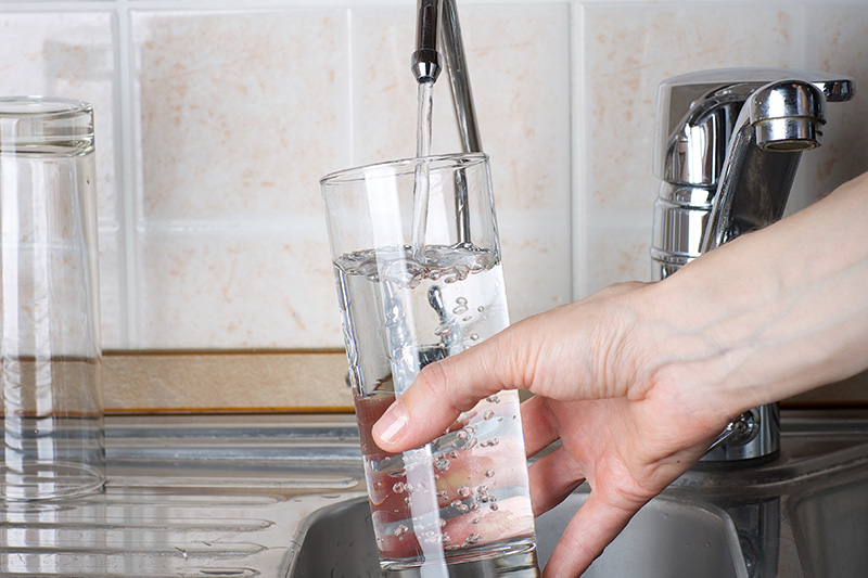 image of a sink with a water glass