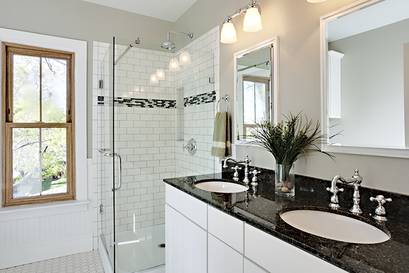 bathroom remodel with black and white tile